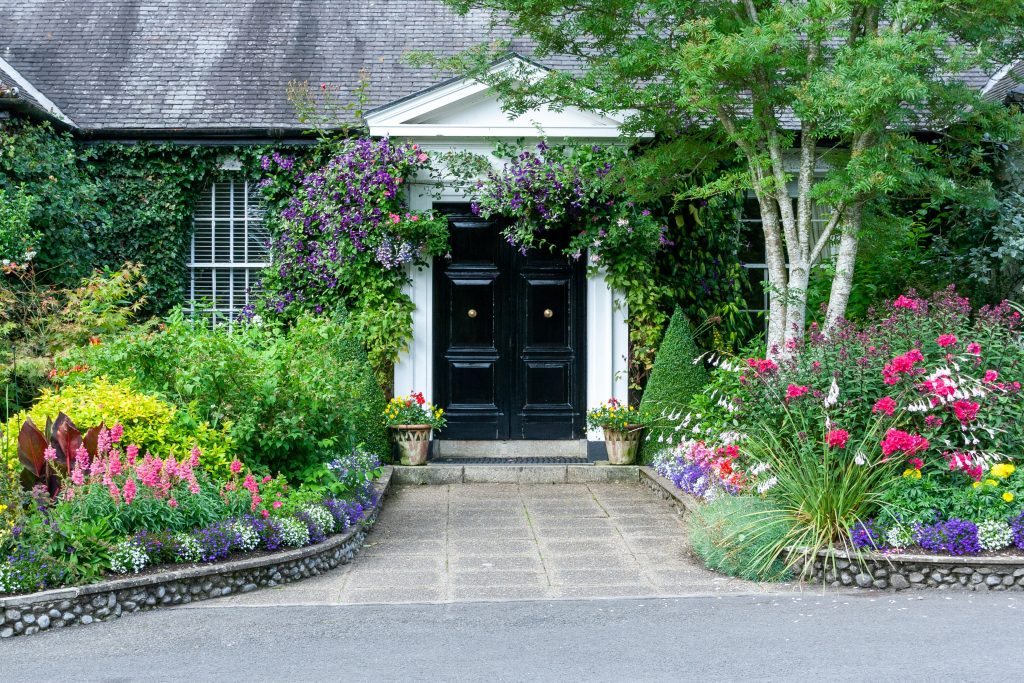 Pretty flower garden at the front of a house in Ireland
