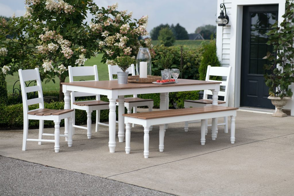 White garden furniture on a garden patio dining space
