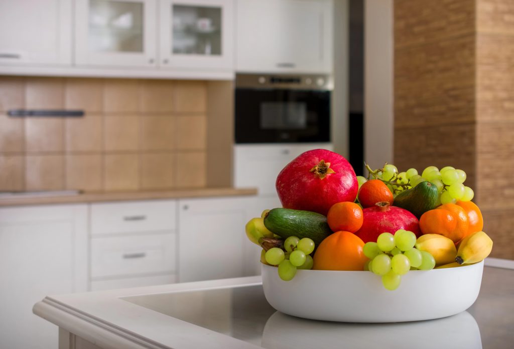 Bowl of fresh fruit on a kitchen countertop